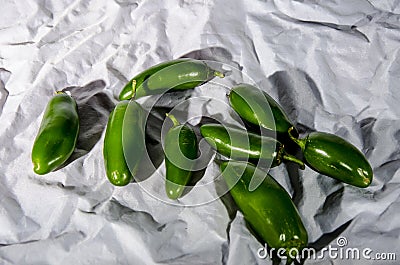 Lots of green hot jalapeno peppers Stock Photo